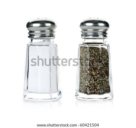 Glass salt and pepper shakers isolated on white background