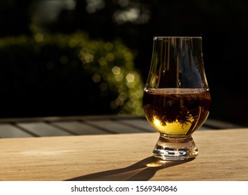 A Glass Of Scotch, Neat, In The Evening Sun