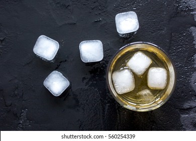 Glass Of Scotch On Dark Background Top View