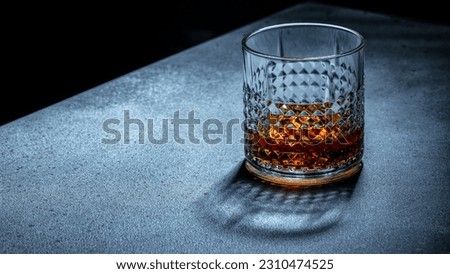Glass of scotch whiskey, Hard strong alcoholic drink, place for text, top view,