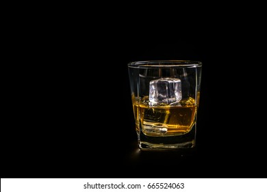 Glass Of Scotch Whiskey And Ice