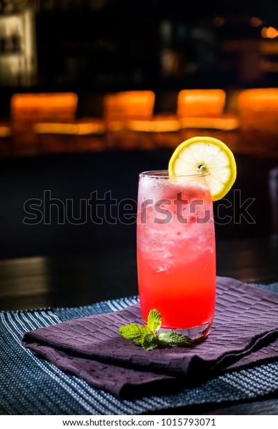 A glass of Sea Breeze\
cocktail