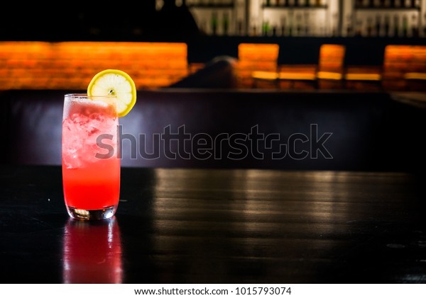 A glass of Sea Breeze\
cocktail