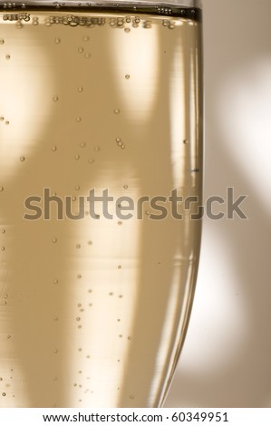 Glass with shampagne on the creative background
