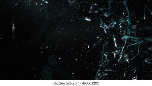 Glass Shards Flying Through The Air After Broken Window