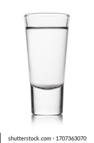 Glass shot of russian pure vodka on white background with reflection