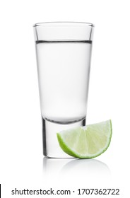 Glass Shot Of Silver Tequila With Lime Slice On White Background.