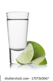 Glass Shot Of Silver Tequila With Lime Slices On White Background.