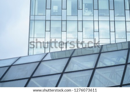 Similar – mirrored facade of an office building