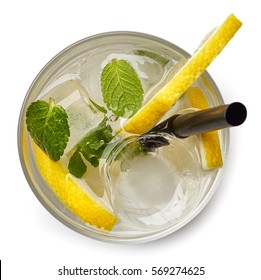 Glass Of Soda Drink With Lemon Slices And Mint Isolated On White Background. From Top View