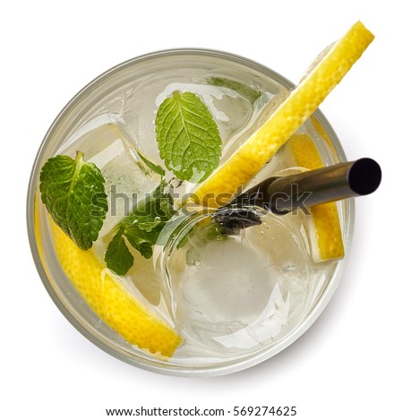 Glass of soda drink with lemon slices and mint isolated on white background. From top view