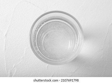 Glass Of Soda Water On White Table, Top View