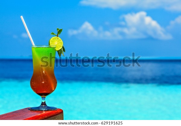 Glass Soft Drink On Beach Table Stock Photo (Edit Now) 629191625