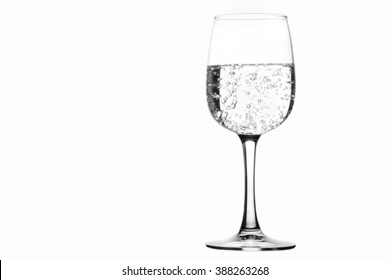 A Glass Of Sparkling Water Isolated On White Background