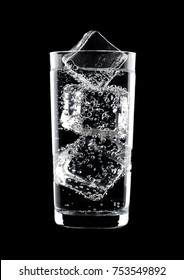 Glass Of Sparkling Water Soda Drink With Ice On Black Background