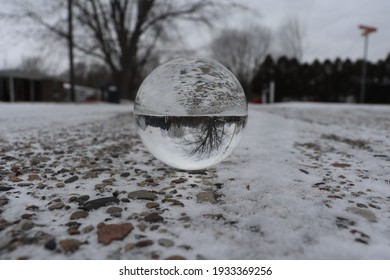 Glass Sphere In The Middle Of A Back Road