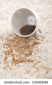 A glass of spilled coffee  on brand new carpet is sure to leave a stain.