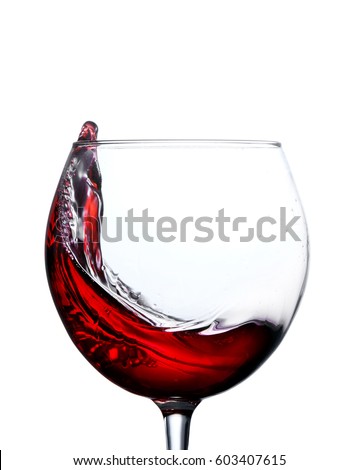 Glass with a splash of red wine isolated on white background