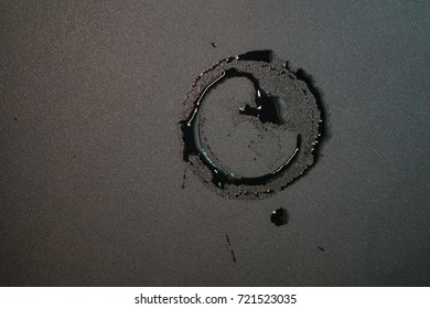 Glass stains and water drop on metal table background.