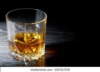 A Glass Of Straight Whiskey On A Dark Wooden Background, Whisky