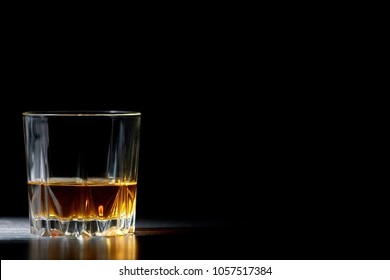 A Glass Of Straight Whiskey On A Dark Wooden Background, Whisky