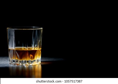 A Glass Of Straight Whiskey On A Dark Wooden Background, Whisky