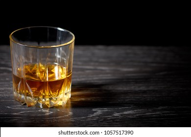 A Glass Of Straight Whiskey On A Dark Wooden Background, Whisky