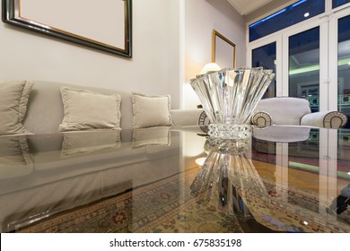 Glass Table Top With Reflection In The Living Room