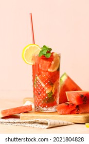 Glass Of Tasty Cold Watermelon Lemonade On Table