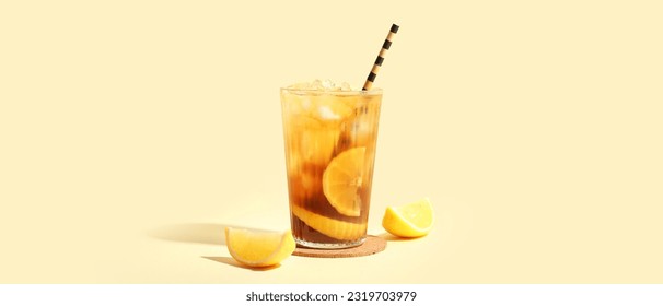 Glass of tasty Long Island iced tea on light beige background - Powered by Shutterstock