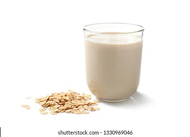 Glass Of Tasty Oat Milk On White Background