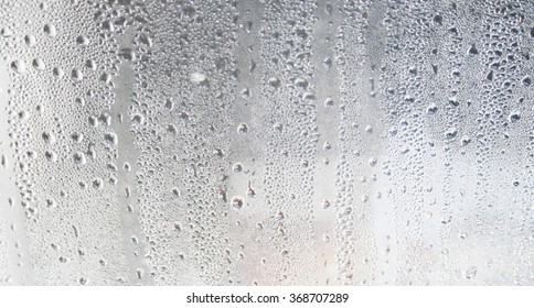 Glass Texture Background On Shower Room In Bathroom With Water Drops