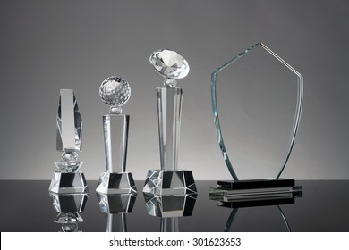 Glass Trophy In Gray Background