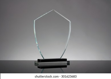 Glass Trophy In Gray Background