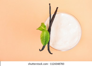 Glass With Vanilla Milk Shake On Color Background, Top View