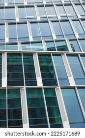 Glass Wall Exterior Of High Rise Building As Background