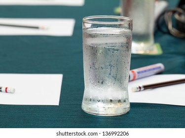 Glass With Water In The Conference Room.