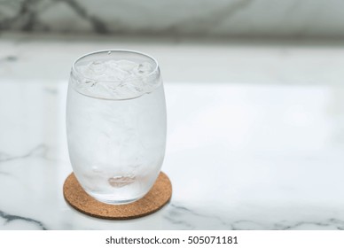 A Glass Of Water With Ice