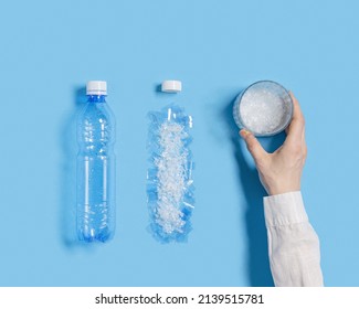 Glass of water with microplastic particles instead of clean water, plastic pollution concept, plastic garbage destructioned and has negative impact on environment, get into food and water, top view