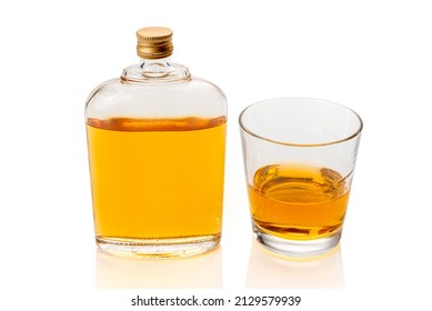 Glass Whiskey Hip Flask, Or Whisky Or Bourbon, Near A Glass Of Whiskey  Isolated On White, Clipping Path