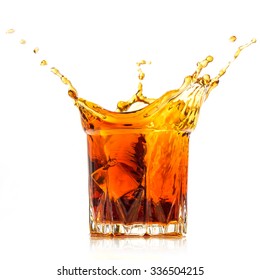 Glass With Whiskey Splash On White Background