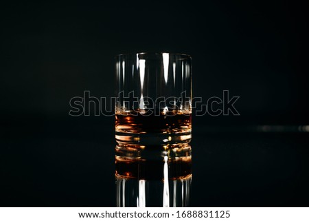 Similar – Image, Stock Photo a small glass of coffee and a white flower on a walnut table