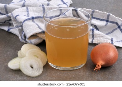 Glass Of White Onion Juice And Its Ingredients Close-up 