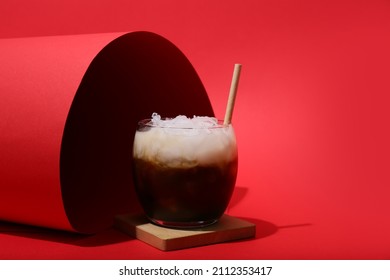 Glass Of White Russian Cocktail On Red Background