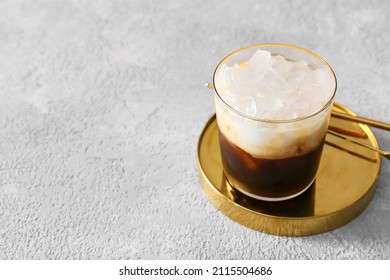 Glass Of White Russian Cocktail On Light Background