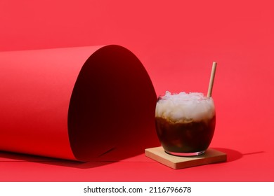 Glass Of White Russian Cocktail On Red Background