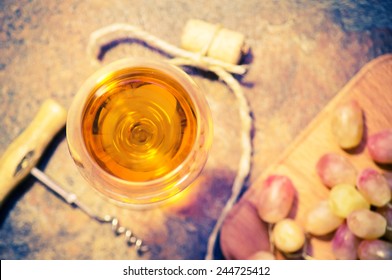 Glass Of White Sweet Dessert Wine With Grapes