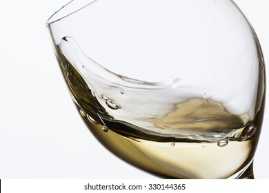 Glass Of White Wine On White Background