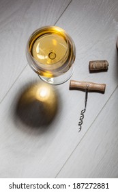 Glass Of White Wine On Wooden Table. Top View