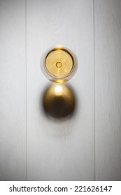 Glass Of White Wine On Wooden Table. Top View